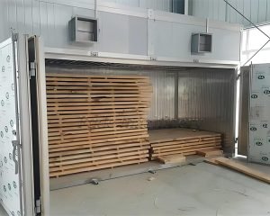 How does a box type wood dryer work